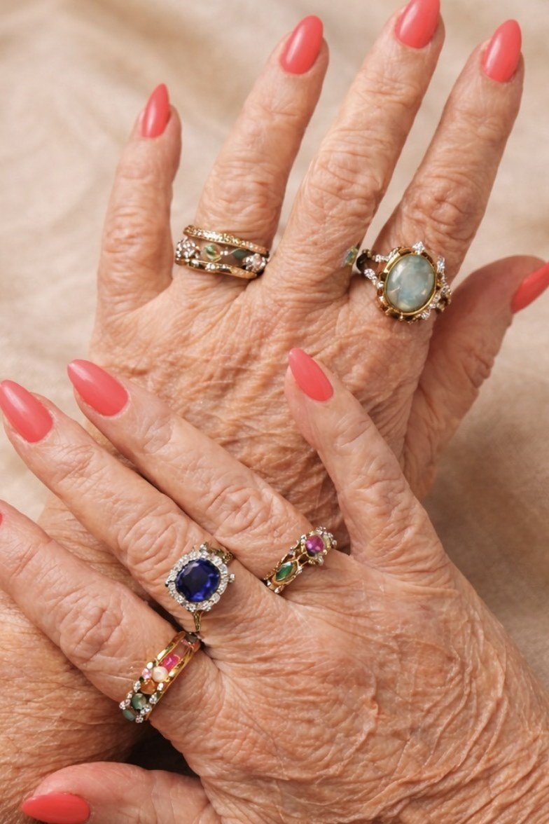 coral pink short nails with rings for older women