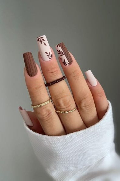 Matte taupe nails with leaf line art, fall nail design for older women