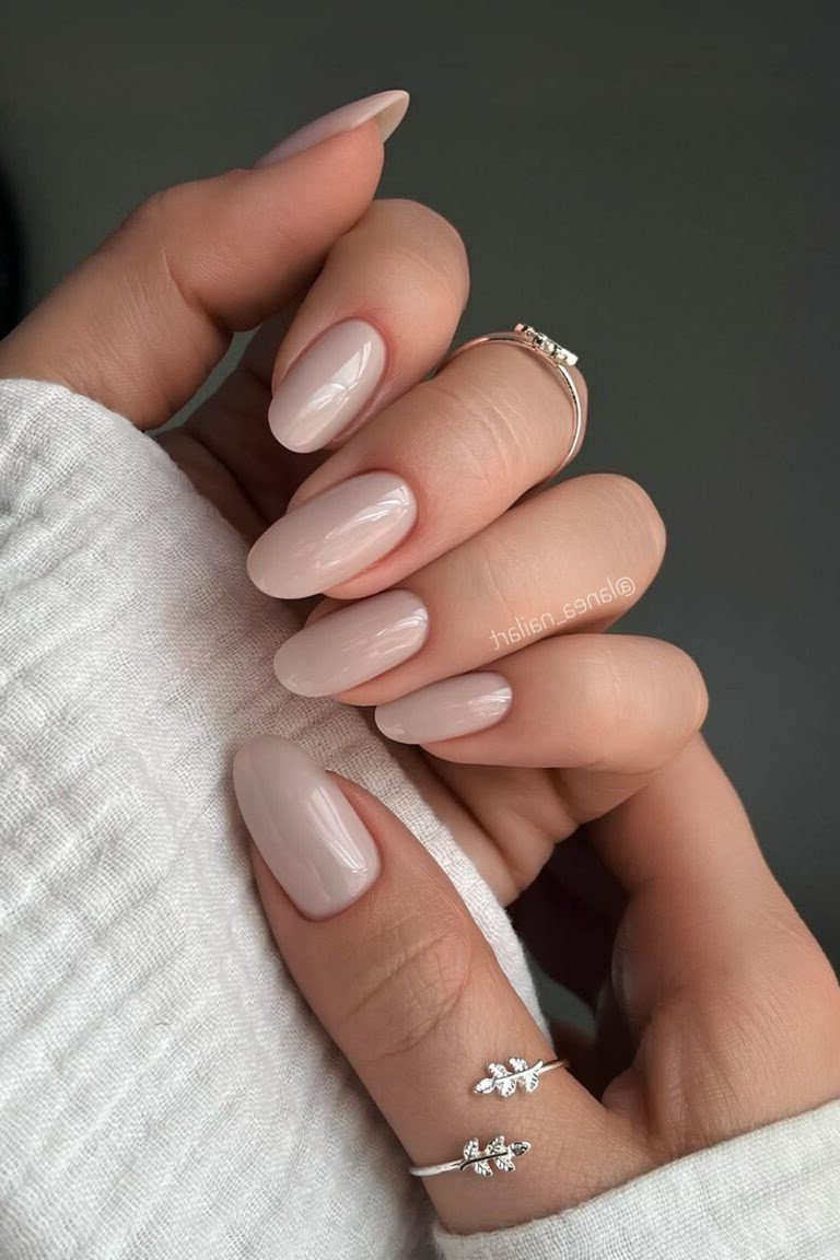 Milky pink nails with rings, sophisticated nail design for women over 50