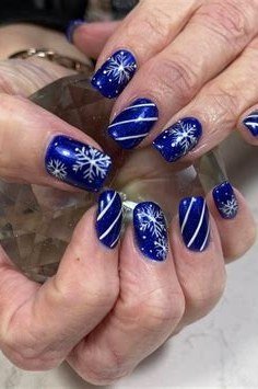 Royal Blue Snowflake Nails for Mature Hands - royal blue snowflake mature hands, glitter winter nail design for women over 60