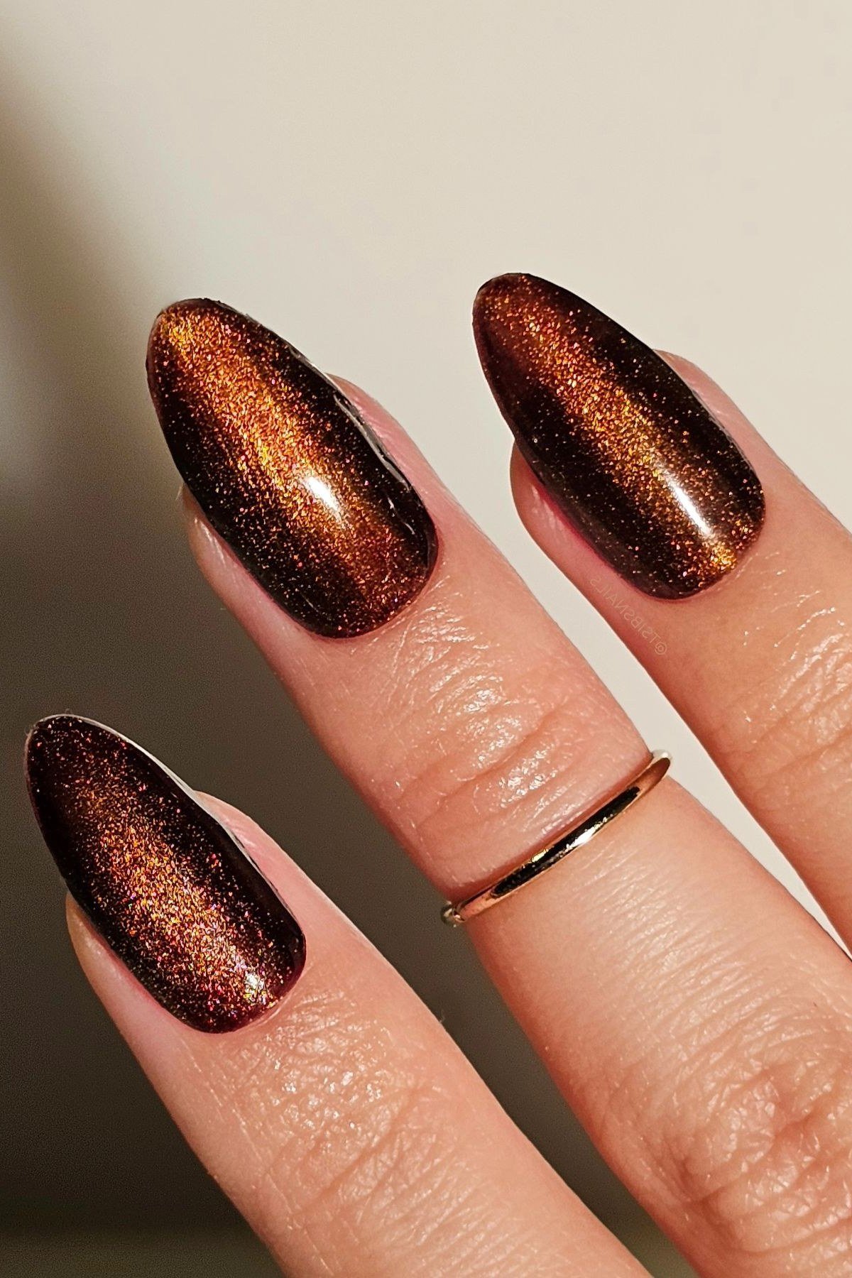 34. Copper Cat Eye Chrome Nails - Thanksgiving nail art idea for women over 50