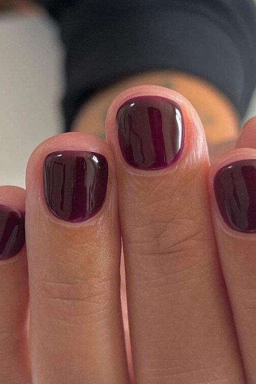 Burgundy Oval Gloss - short nail design for women over 60 that makes nails look longer