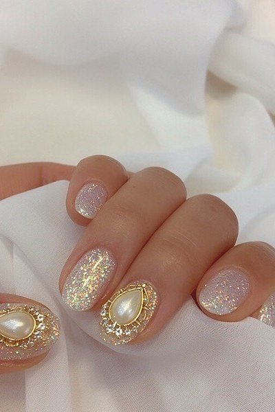 Gold Glitter Nails with Pearl and Crystal Accents - pearl finish nail idea for women over 60