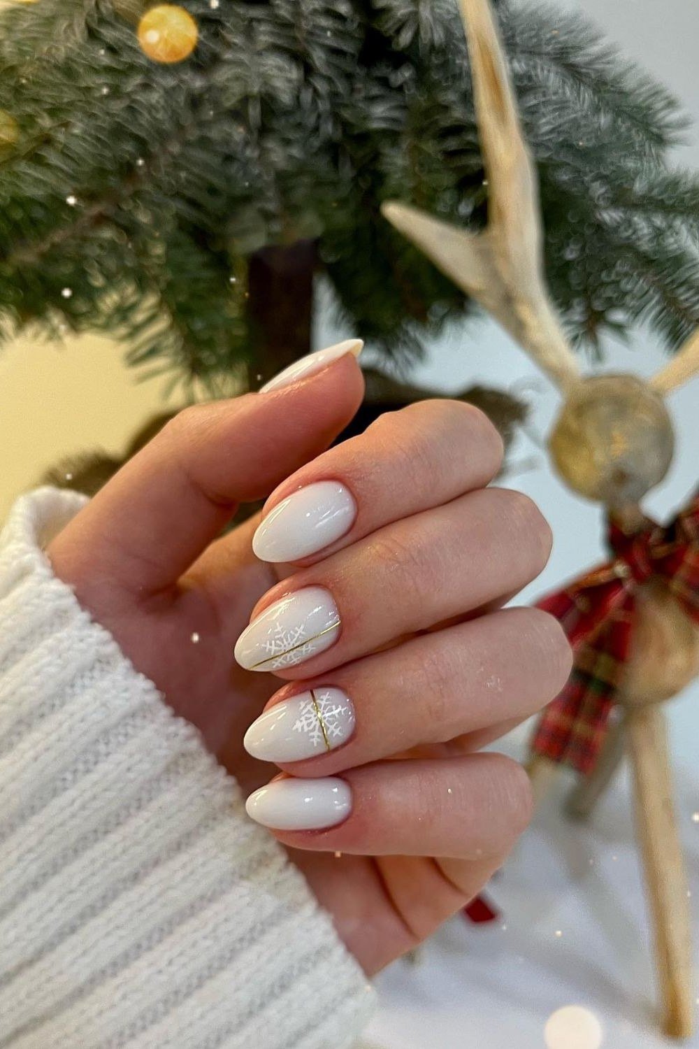 white with gold tree, white sweater