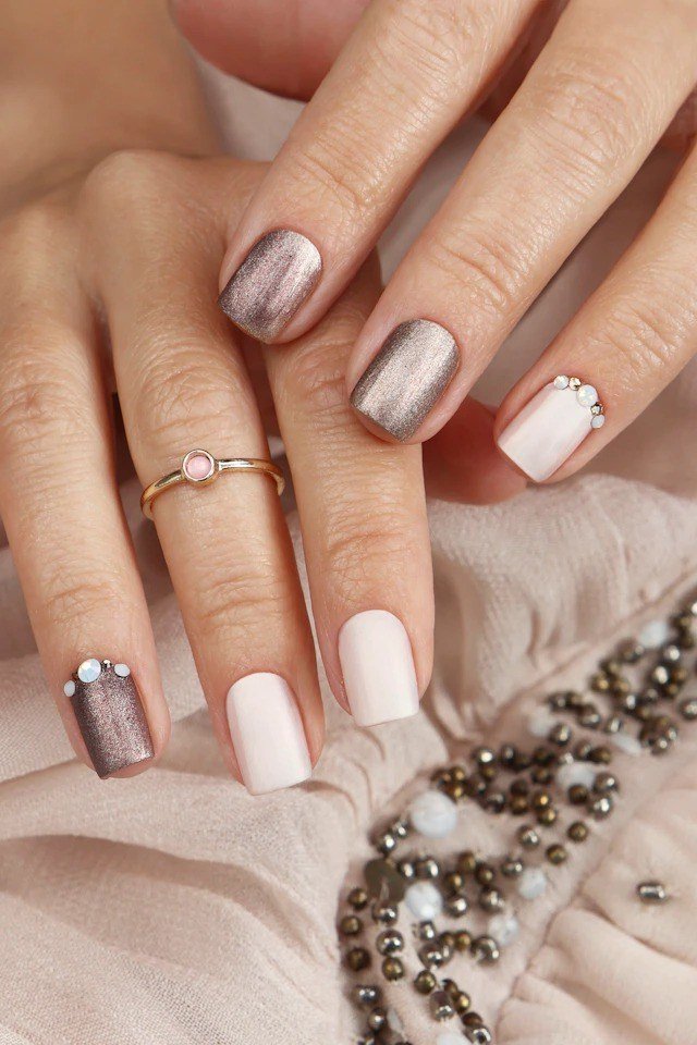 white grey and glitter mixed neutral nails
