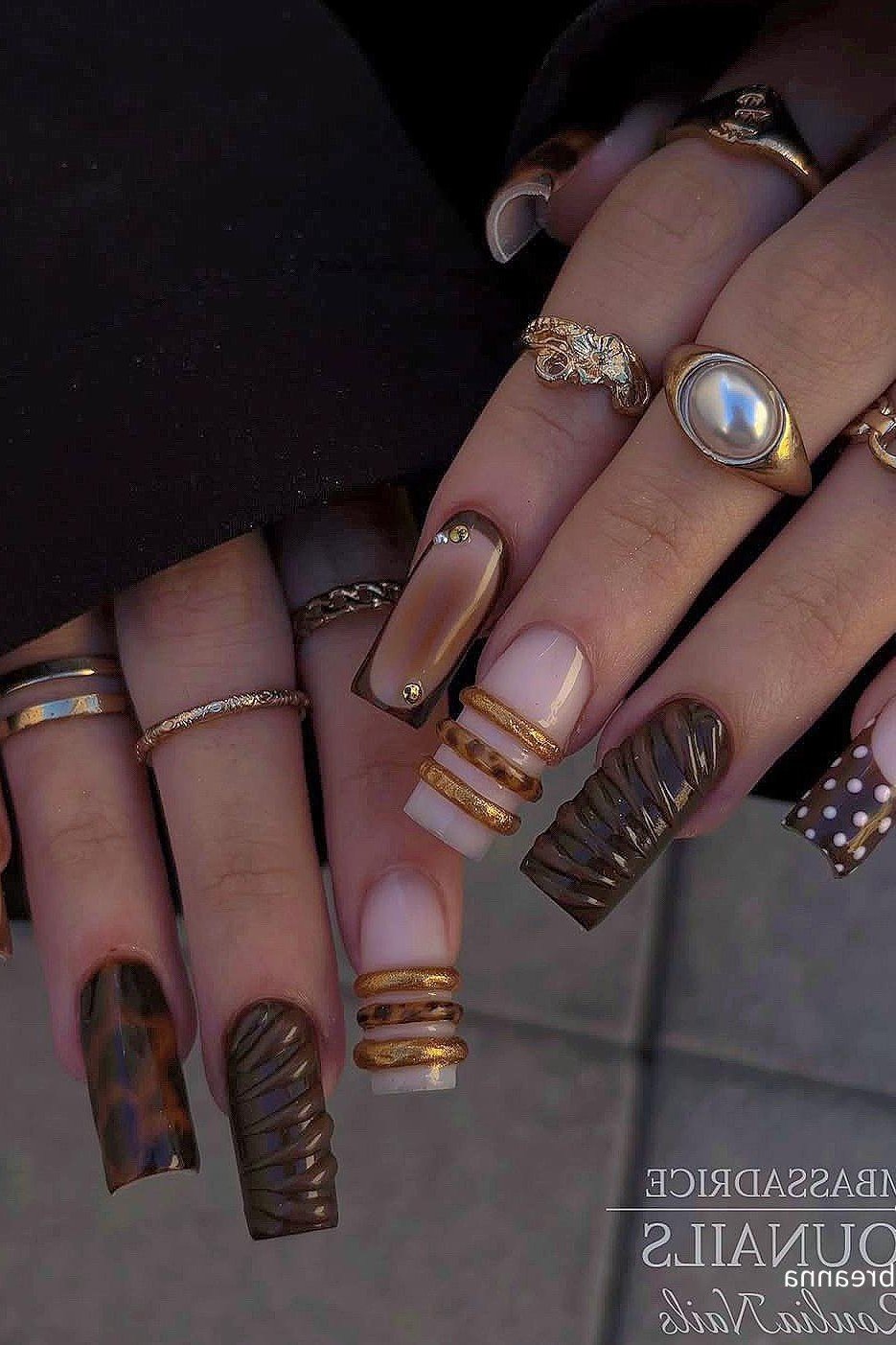 Brown Tortoise with Gold Stripes - fall nail color idea for women over 60