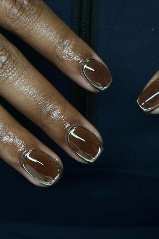 Brown Chrome Oval Nails with Gold Outline - brown nail idea for women over 50