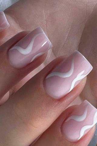 pink almond nails with white swirl line art