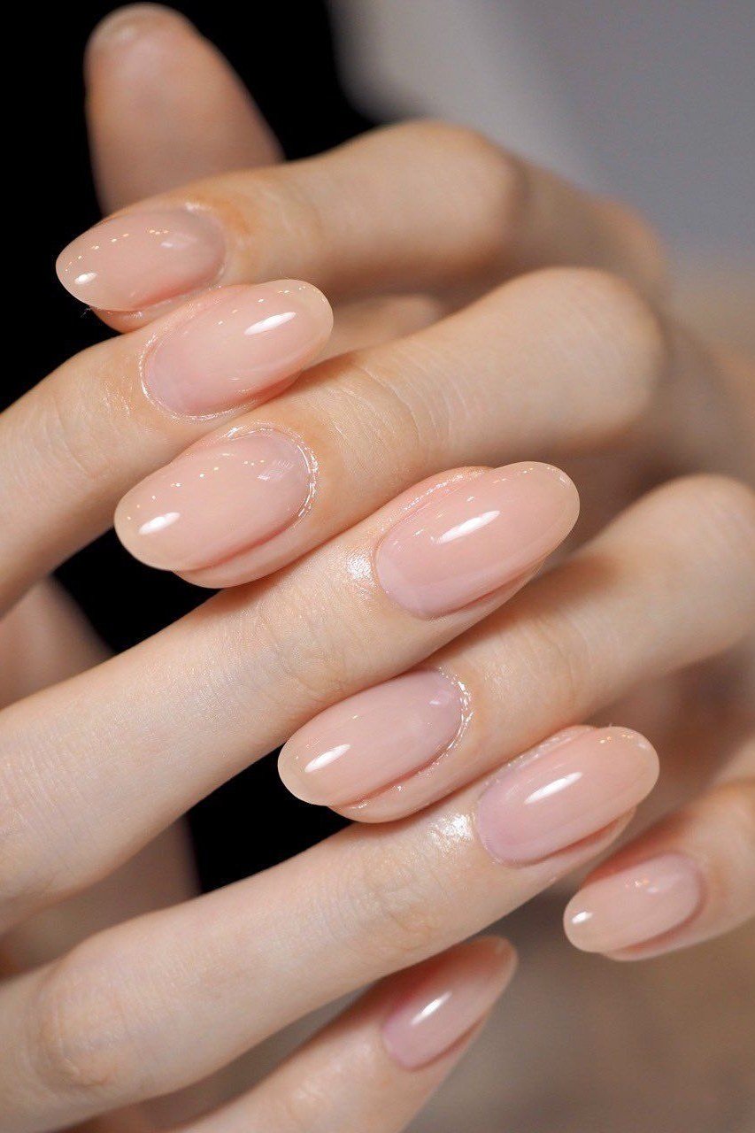 Sheer nude pink nails for women over 50