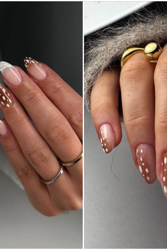 Short nude nails with white fawn spots and gold rings fall nail design