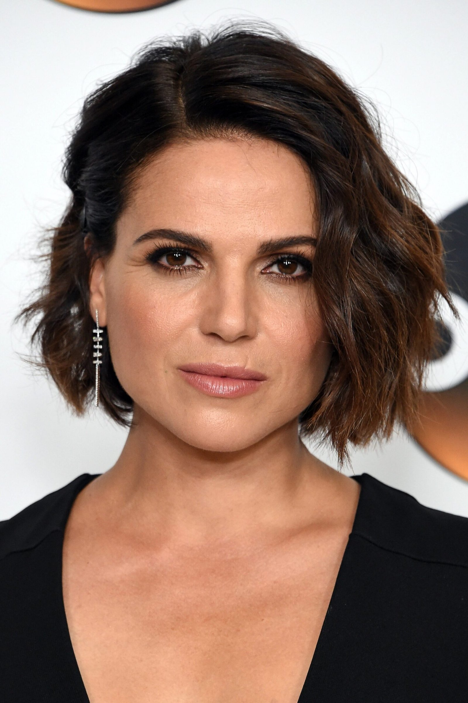 Dark brown wavy bob, front view - wispy hairstyle for women over 40