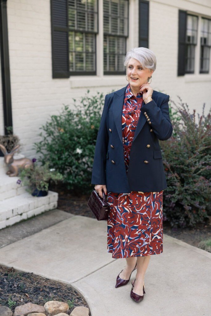 Navy blazer with red floral midi skirt for women over 60