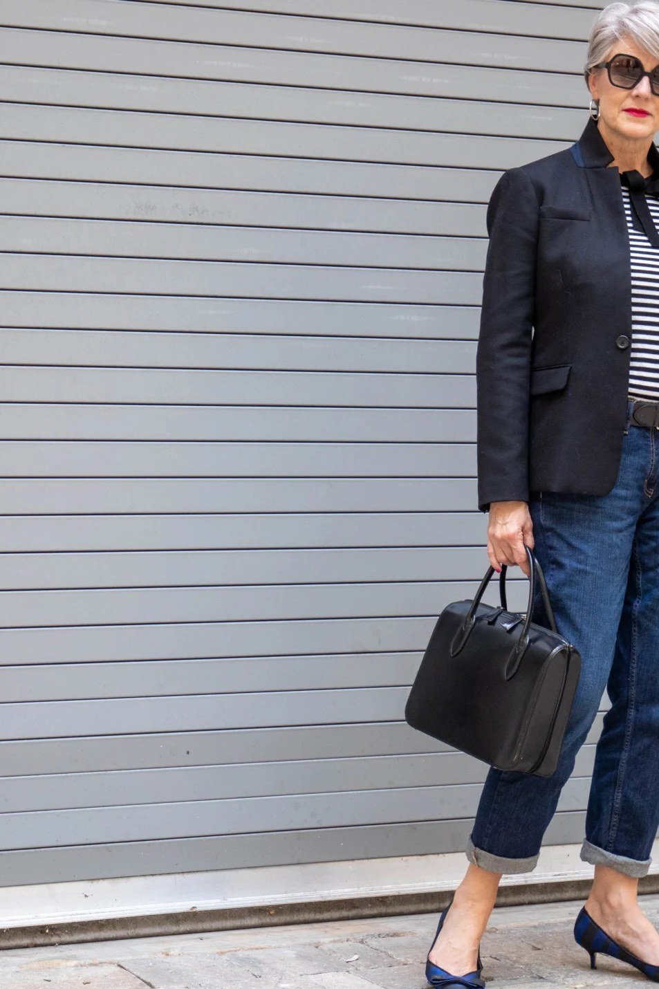 Navy blazer with striped top cuffed jeans and flats, preppy outfit for women over 40