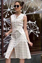 White grid-print shirt dress with sunglasses, storefront for women over 60