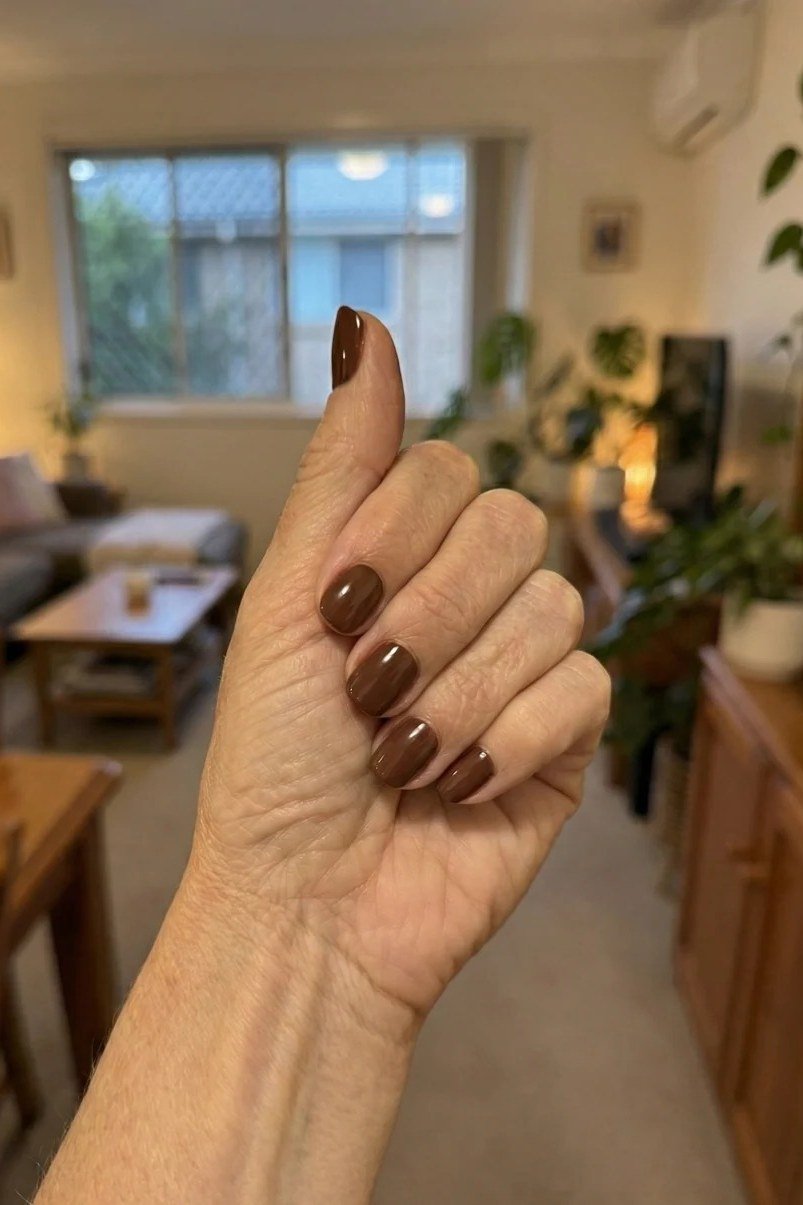Cozy Brown in the Living Room - fall nail color idea for women over 60