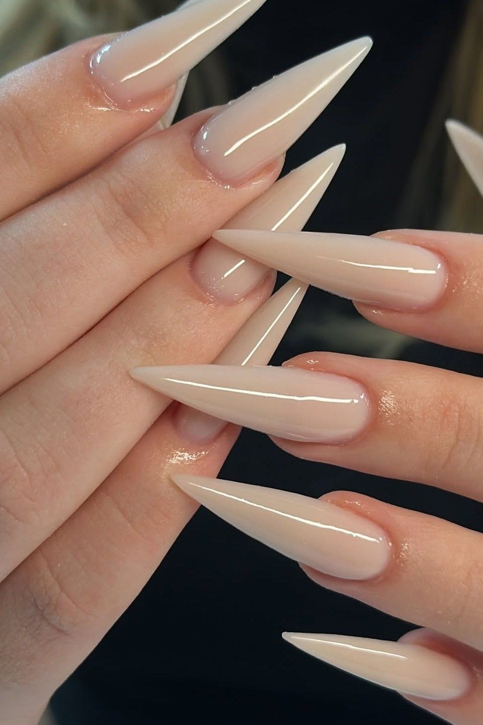 Long Nude Stilettos - nude nail art idea for women over 40