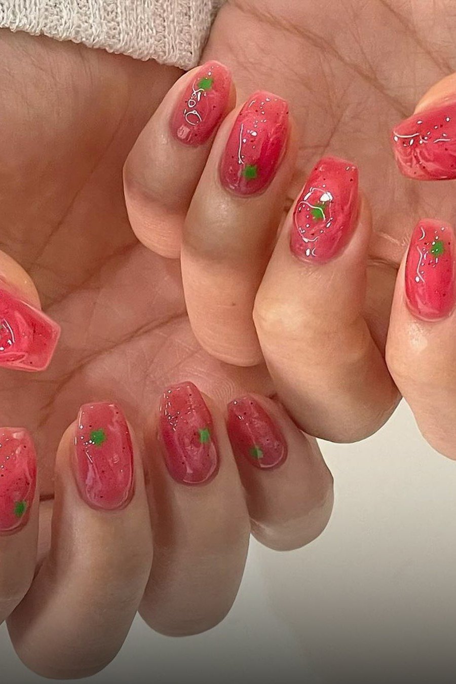 Short round jelly nails with strawberry art