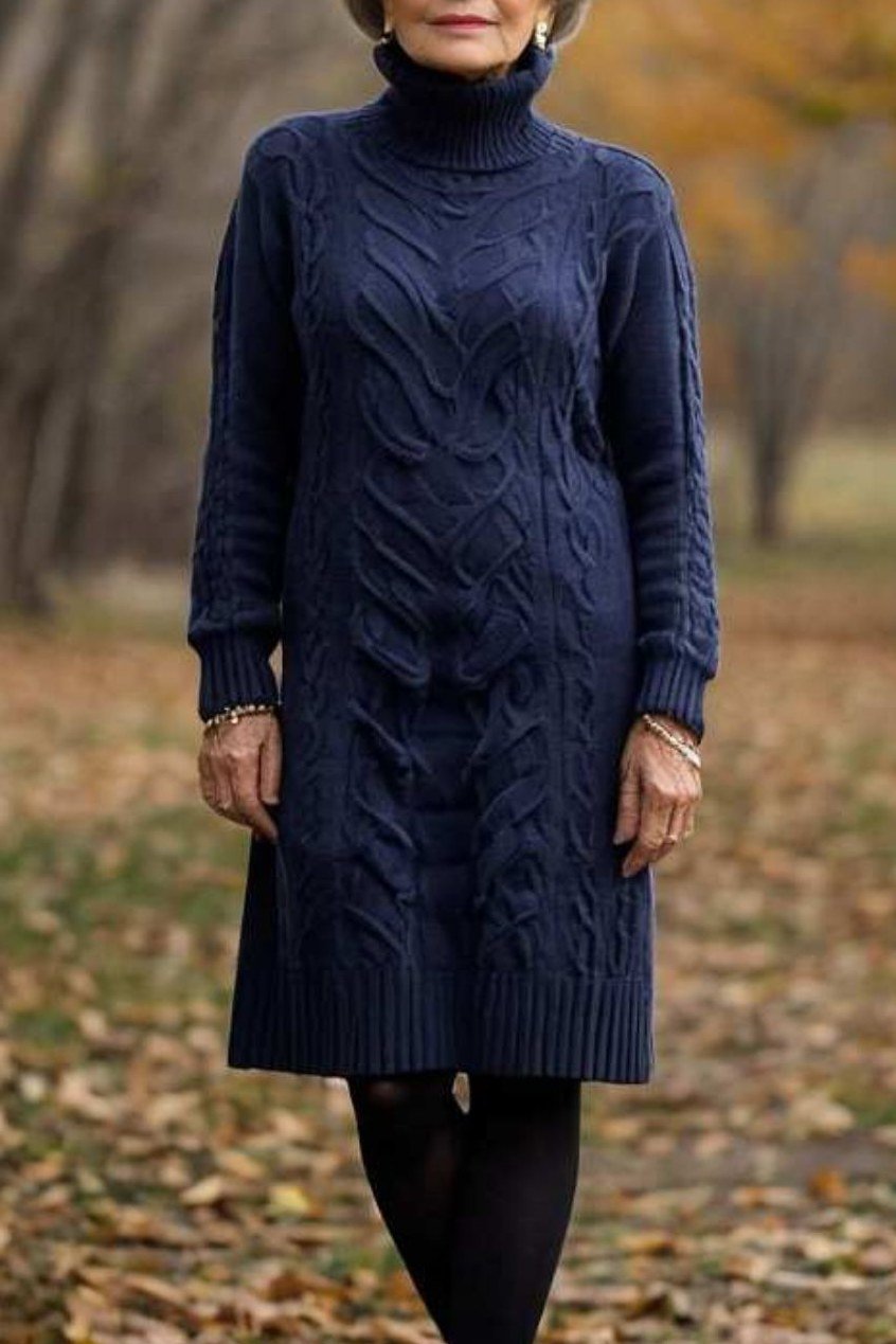 Navy cable turtleneck dress with black tights and boots, fall outfit for women over 50