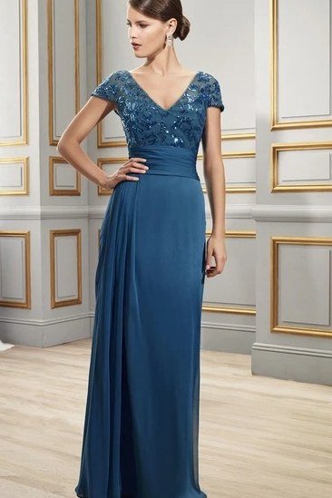 Dusty blue chiffon cap-sleeve gown - wedding guest outfit for women over 50