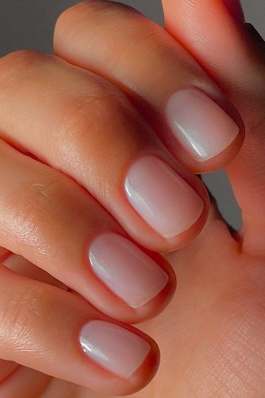 Milky Pale Pink Close Up - short nude nail idea for women over 50