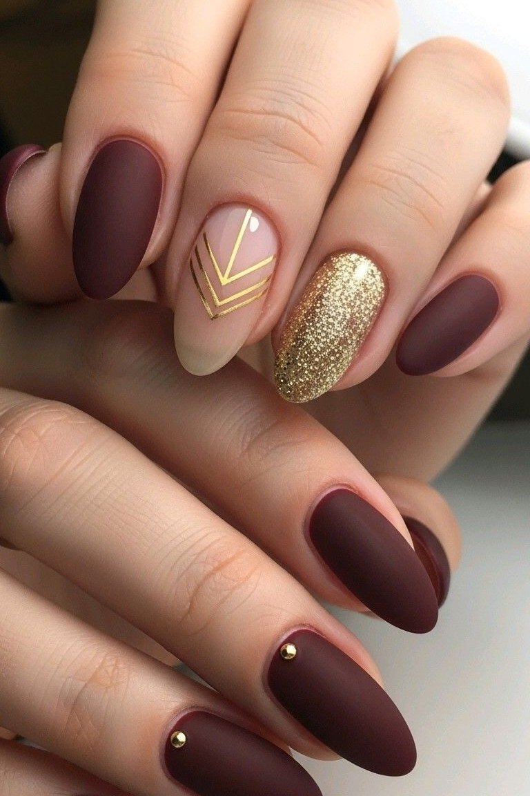 Matte burgundy with gold accent nails, burgundy fall nail idea for women over 60