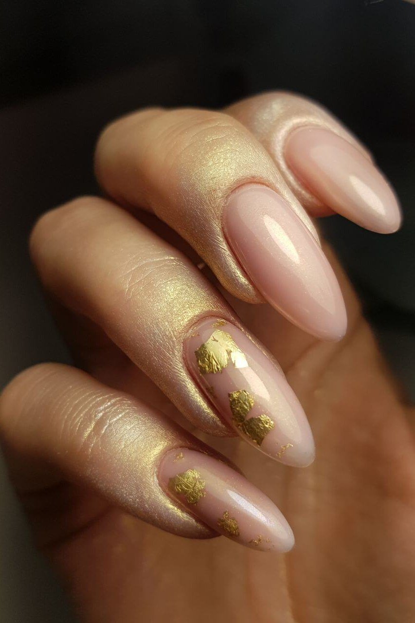37. Nude Nails With Gold Foil Flakes - Thanksgiving nail art idea for women over 50