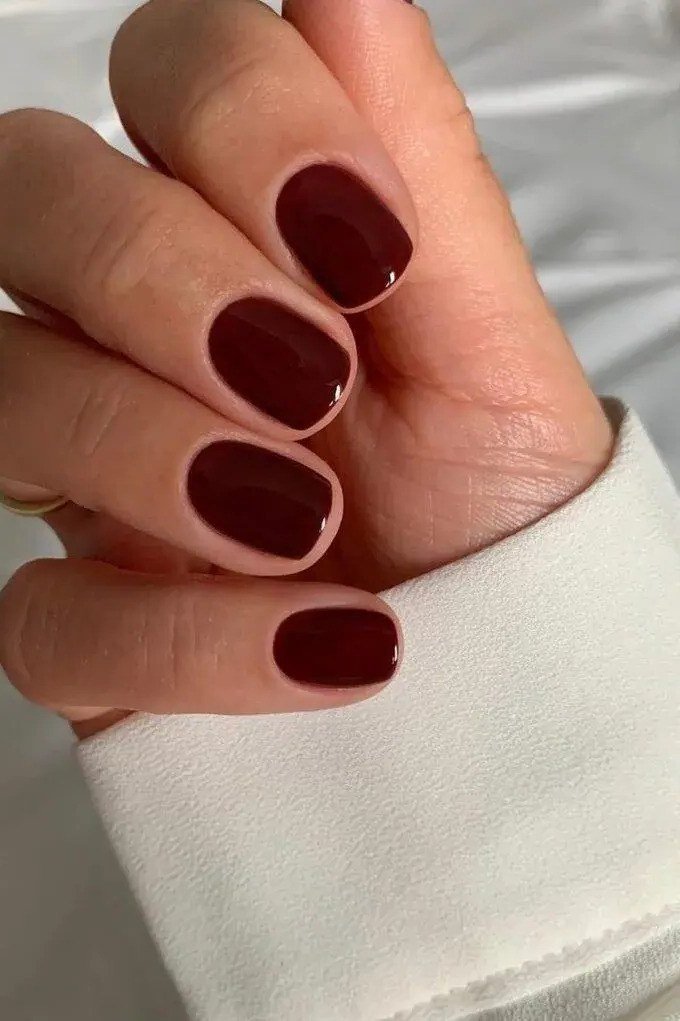 Dark Burgundy Rounded - short nail design for women over 60 that makes nails look longer