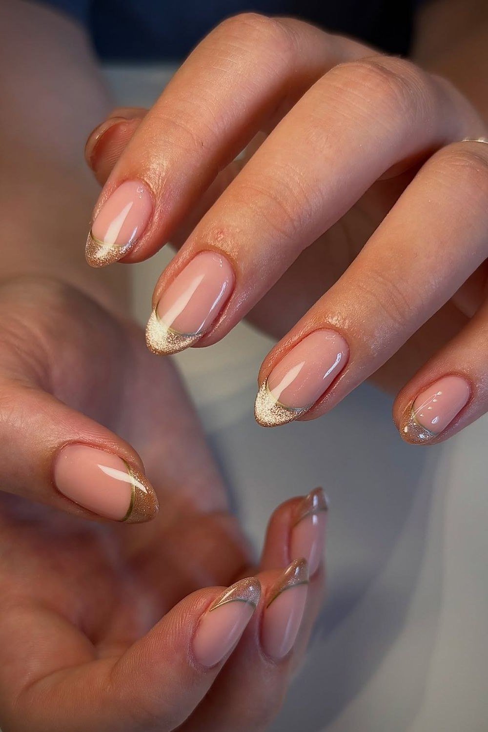 Nude Nails with Gold French Tips, understated glam nail color for women over 60