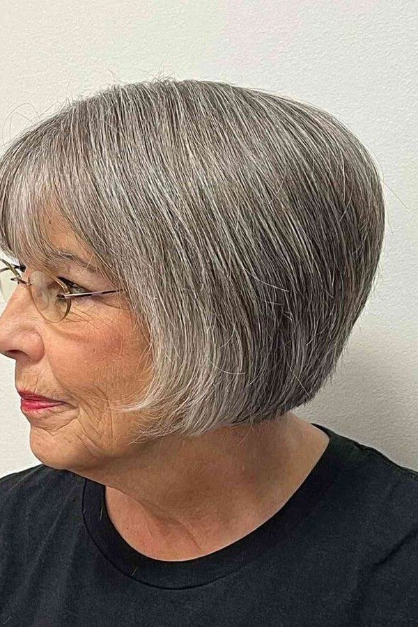 Sleek grey side bob for women over 60