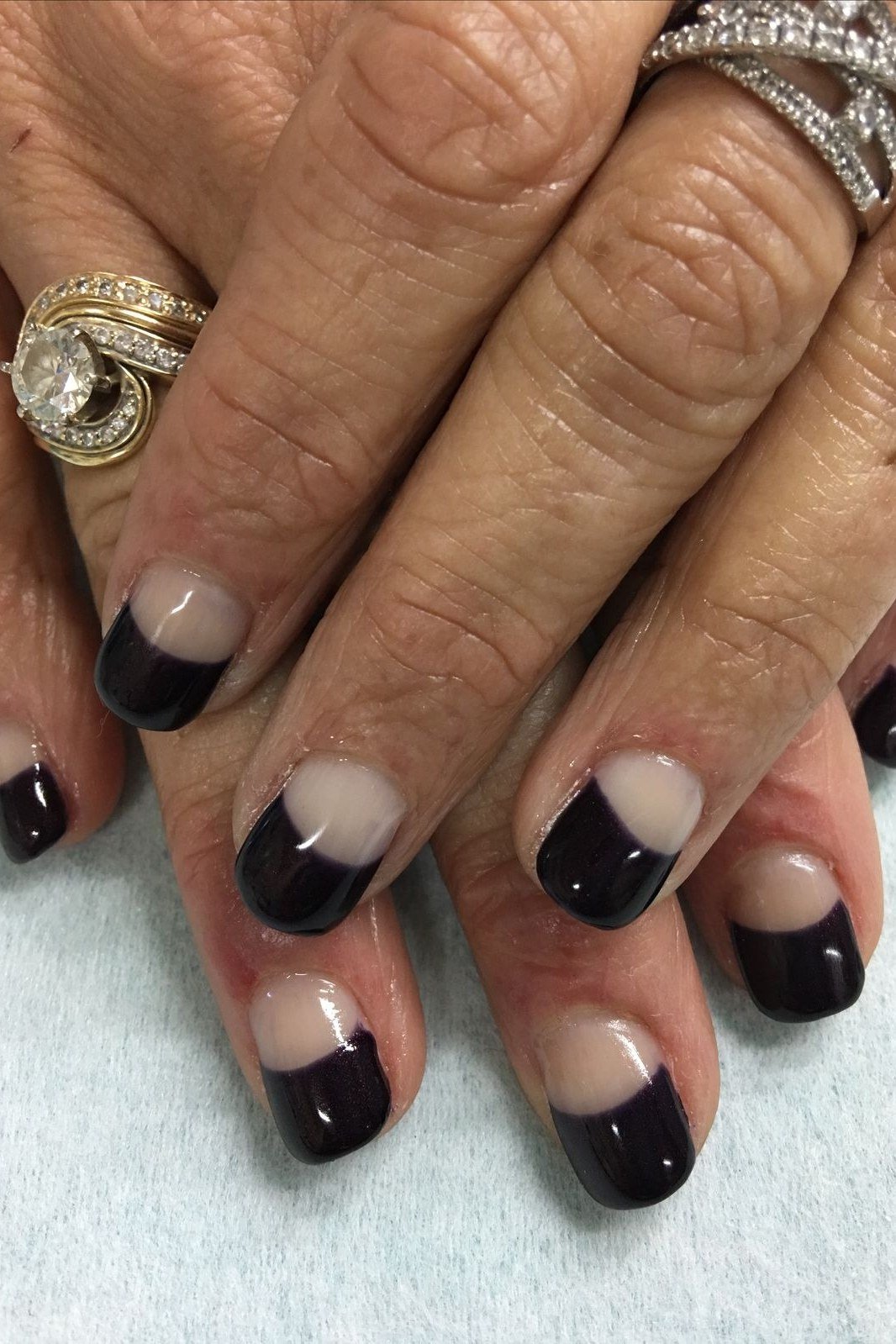 black french tip nails on mature hands