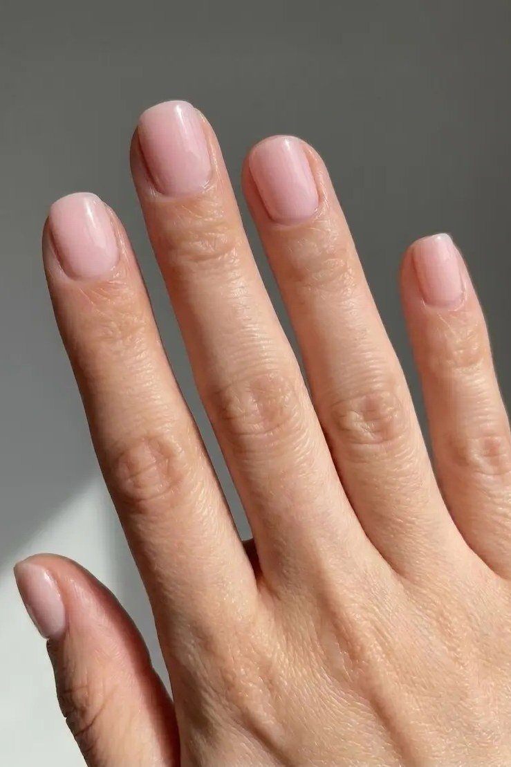 Milky White Short Nails - flattering nail polish shade that hides veins for women over 50