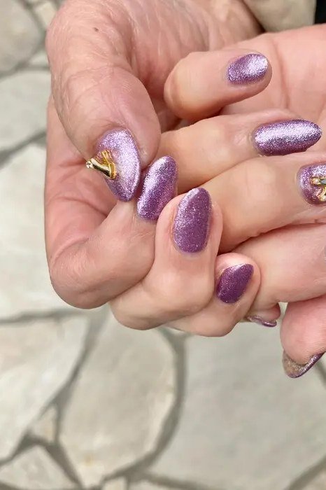 Purple glitter nails for women over 60