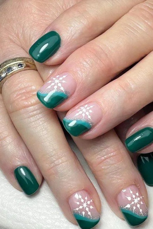 Emerald green with snowflake french accent - Christmas nail design for older women