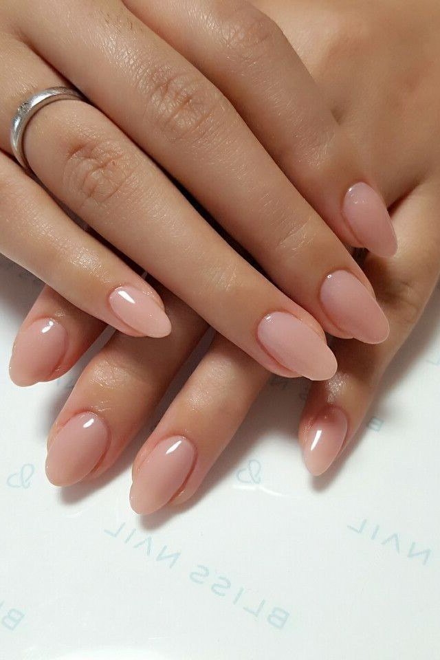 Pink nude nails with silver ring