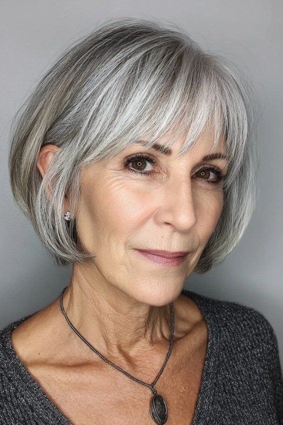 shoulder length layered grey haircut, three quarter side view