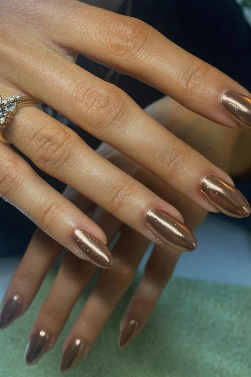 Bronze Chrome Almond Nails with Rings - brown nail idea for women over 50