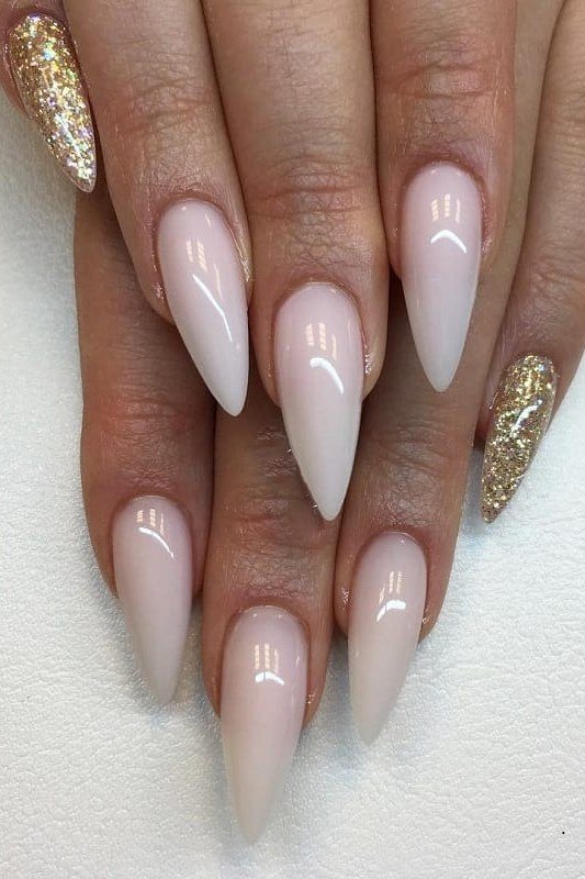 Almond Nudes with Gold Glitter Accent - nude nail art idea for women over 40