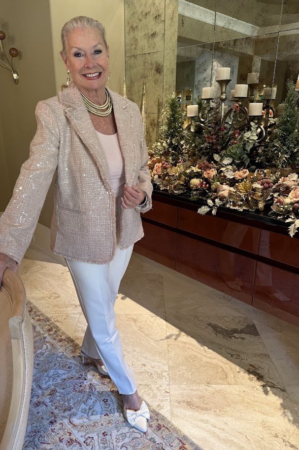 holiday evening outfit for women over 60: champagne sequin blazer with white pants