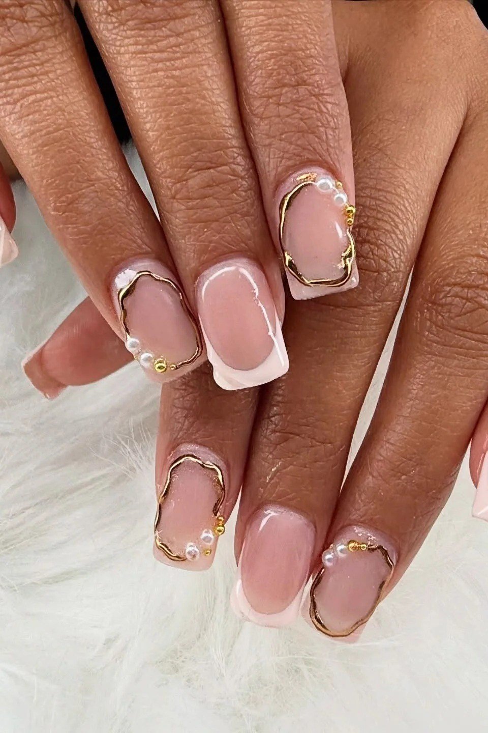 pink nails with gold frame nail art