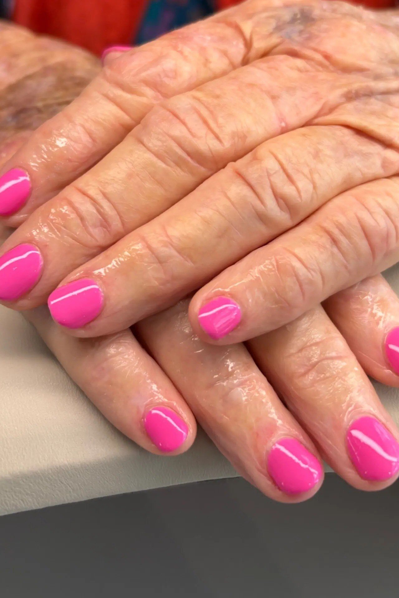 hot pink short oval - winter nail trend for older women