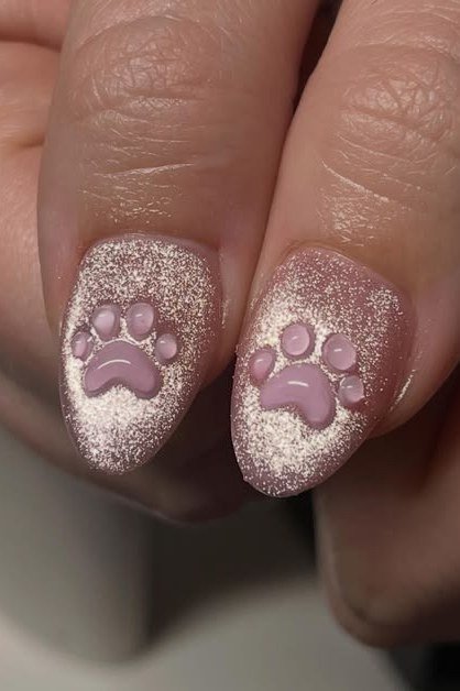 Pink Glitter with Paw Print - elegant nail art idea for mature hands, women over 50