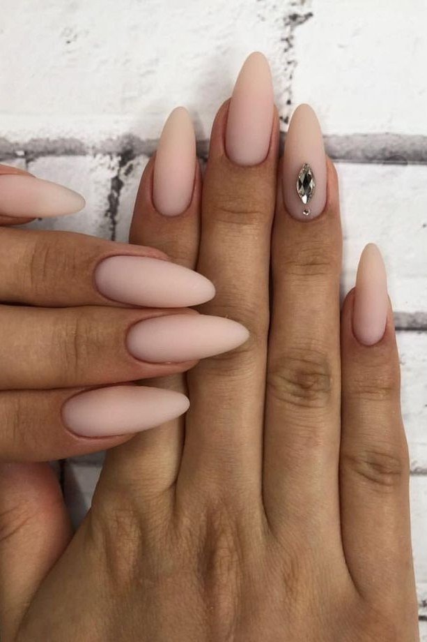 Pale Nude Almond with Crystal Accent - elegant nude nail design for women over 60