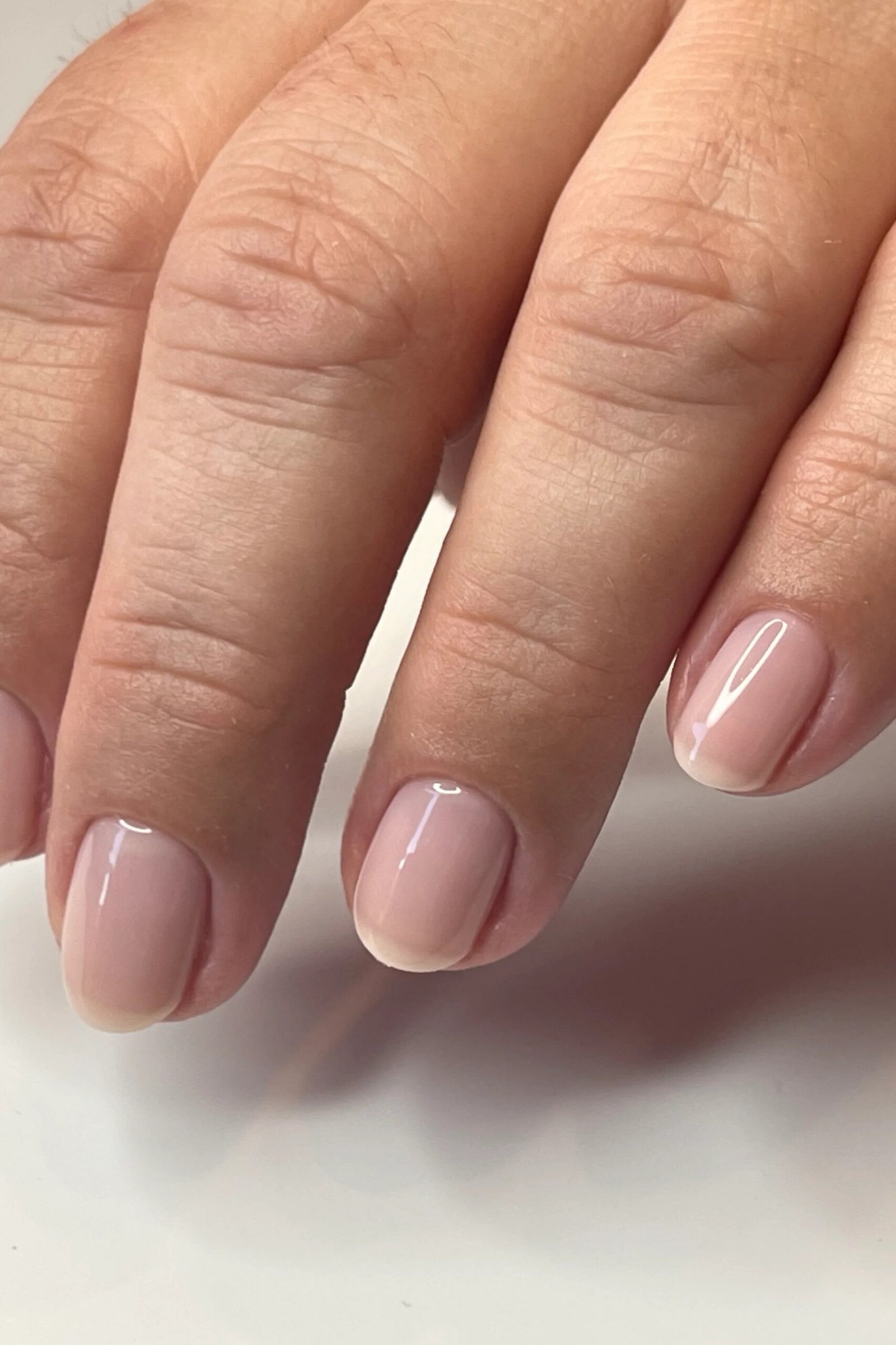 Pale Pink Sheer Nude - short nude nail idea for women over 50