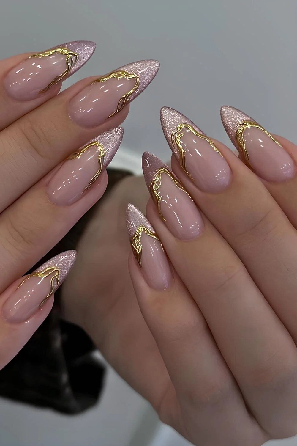 Nude-Pink Almond Nails with Gold Line Art, fun winter nail idea for women over 60