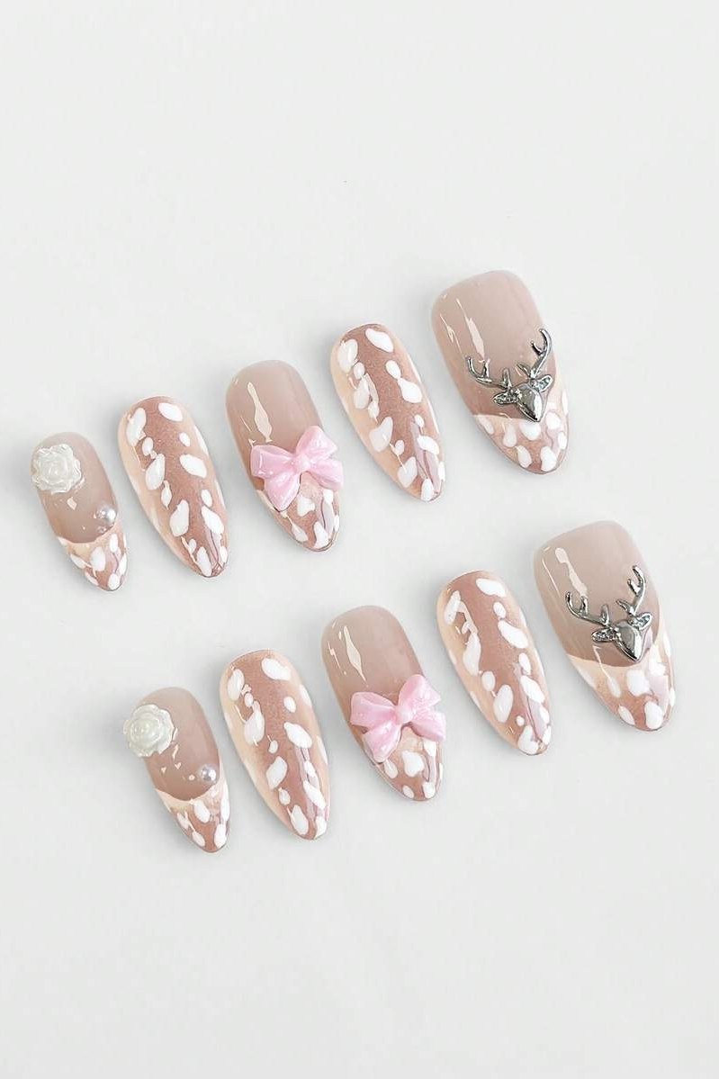 Nude short press-on nail set with white fawn spots pink bows and antler decals