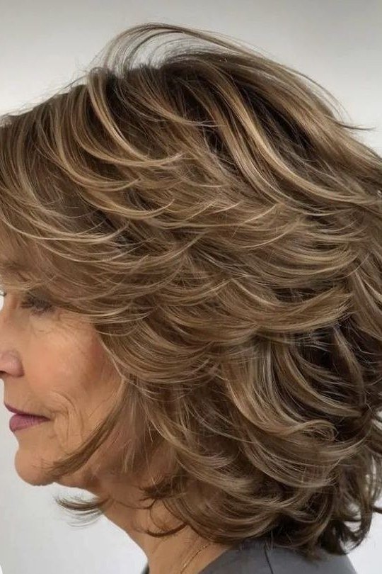 brown feathered shag, side profile hairstyle for women over 70
