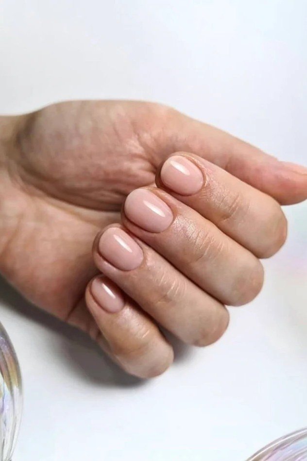 Natural Sheer Nude - short nude nail idea for women over 50
