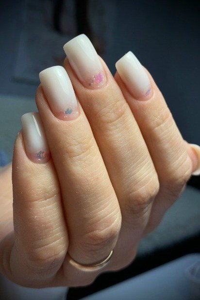 white pink baby boomer fade on short square nails mature hands