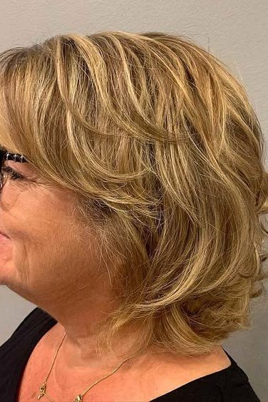 Soft Blonde Shaggy Bob - medium shag haircut for women over 40