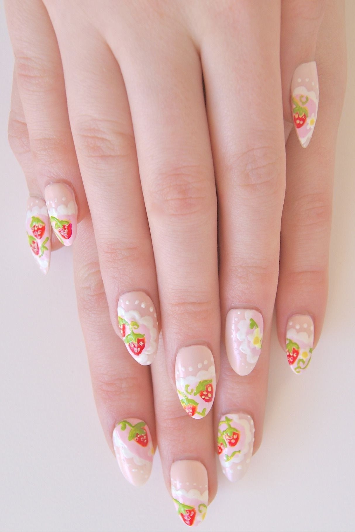 Square nails with tiny strawberry flower art